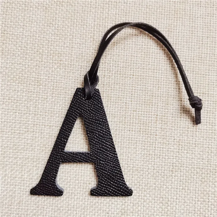 Top Trends: Leather English Letters Charm A Character Bag Pendant Shoppable Styles