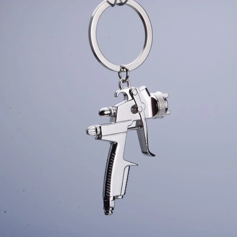 Top Trends: Metal New Water Gun Keychain Car Wash Tools High-pressure Water Gun Model Key Chain Party Gift Pendant Key Ring K2011 Shoppable Styles