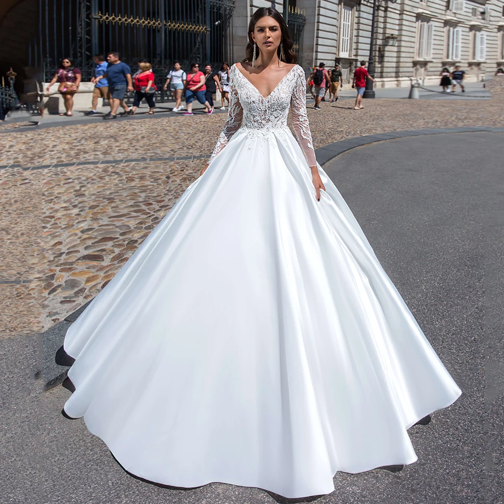 Top Trends: Gorgeous Ball Gown Satin Wedding Dress Deep V Neck Long Sleeveless Lace Appliqued Sweep Train Backless Bridal Gown Shoppable Styles