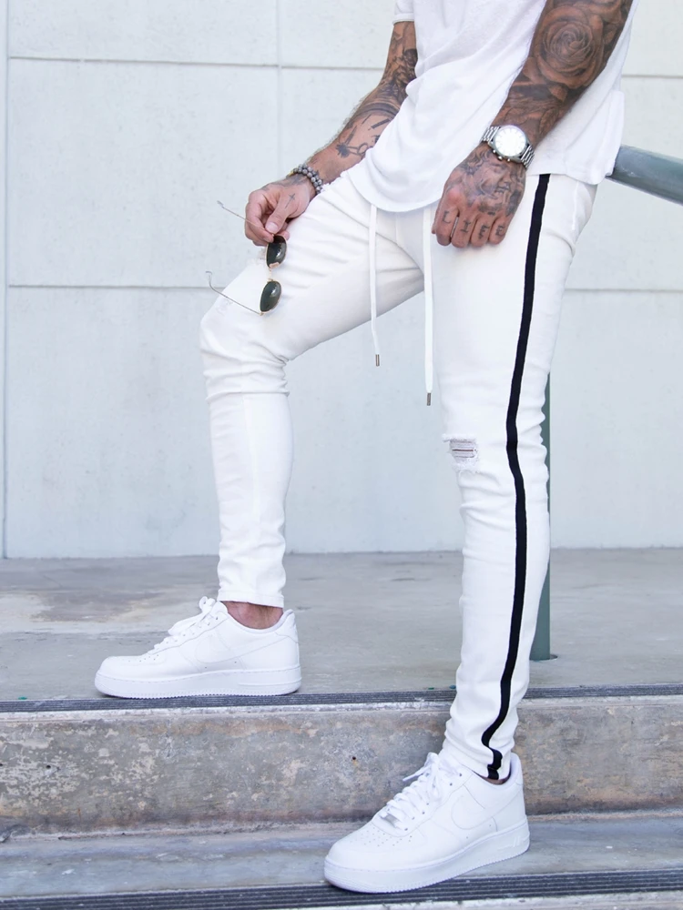 Top Trends: Men's Ripped Pencil Pants Men Skinny Denim Biker Side Striped Jeans Men's Fashion Foot Mouth Zipper Hip-Hop Slim Denim Trousers Shoppable Styles