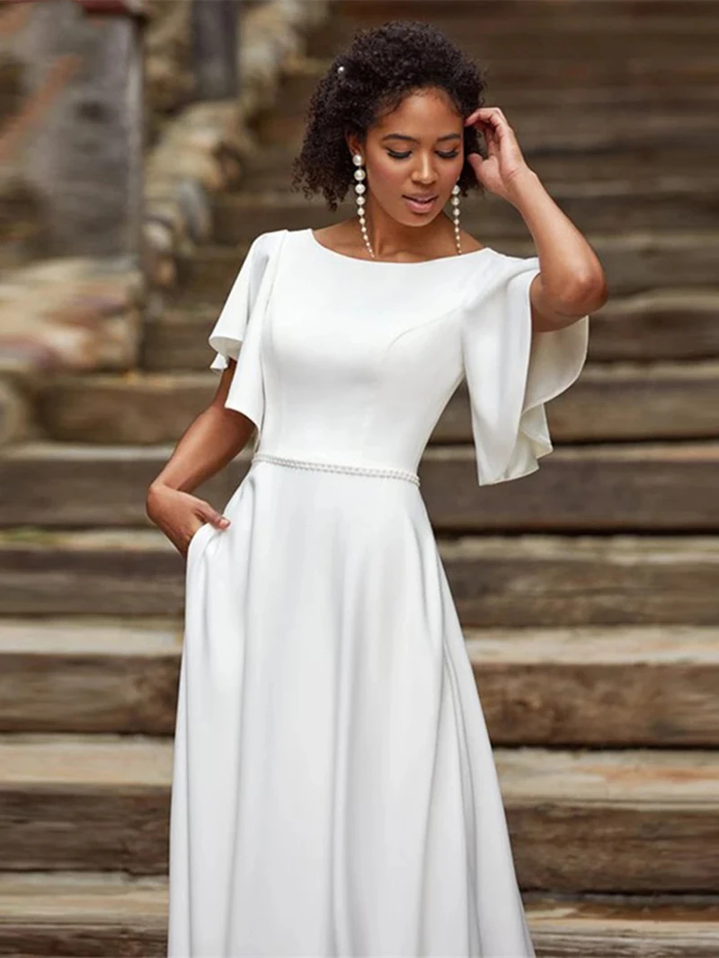 Top Trends: Modern Latest 2023 Wedding Dresses Short Sleeves Ivory Gowns Jewel Neck Bridal Dress Buttons Back Pearls Sweep Train Shoppable Styles - Image 4