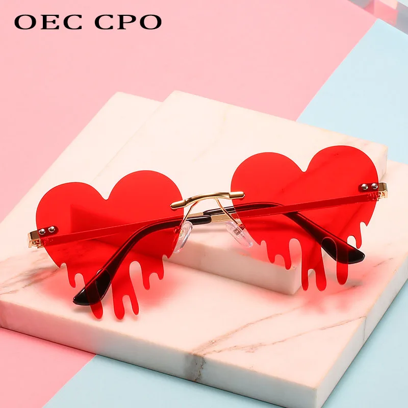 Top Trends: OEC CPO Unique Heart Rimless Sunglasses Women New Fashion Red Blue Tears Shape Sunglasses Female Vintage Steampunk Eyewear UV400 Shoppable Styles