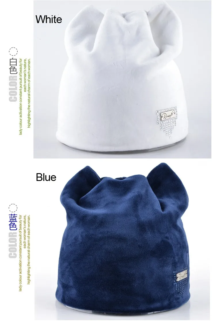 valge ja sinine sametist naiste müts, millel on dekoratiivne silt