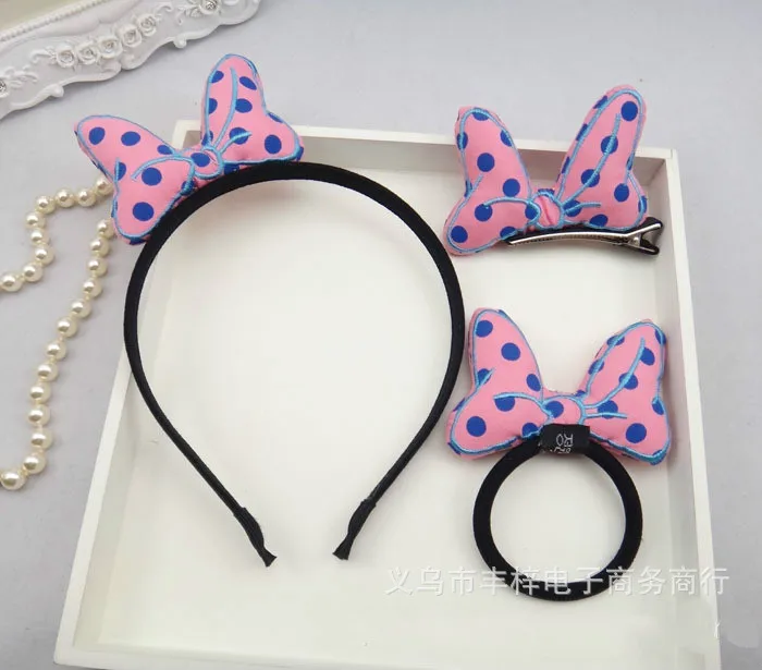 roosa ja sinise täpilise lipsuga peavõru, juuksekumm ja juukselõks