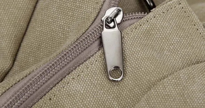 beežist kangast õlakott metallist tõmblukuga