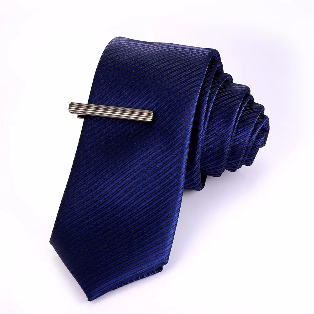 Komplekt mansetinööpidest ja lipsunõelast | kujundav pilt e-kaubamaja pildikogust