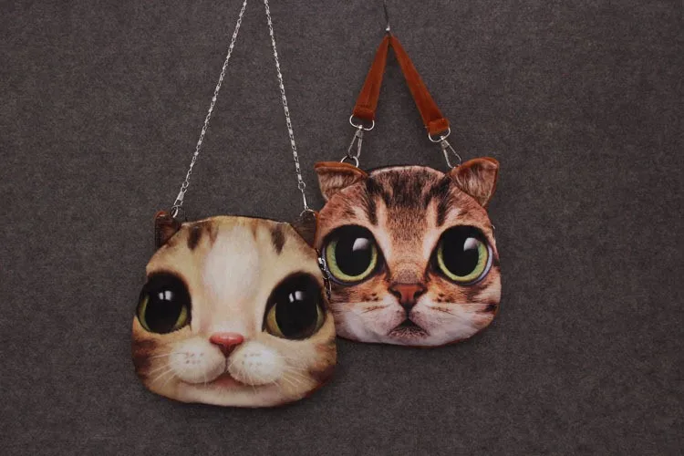 kaks ümarat õlakotti kasside nägudega, üks hele ja teine pruun