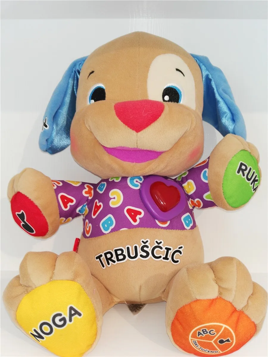 värviline pehme mängukoer, millel on sinised kõrvad ja erinevat värvi käpad