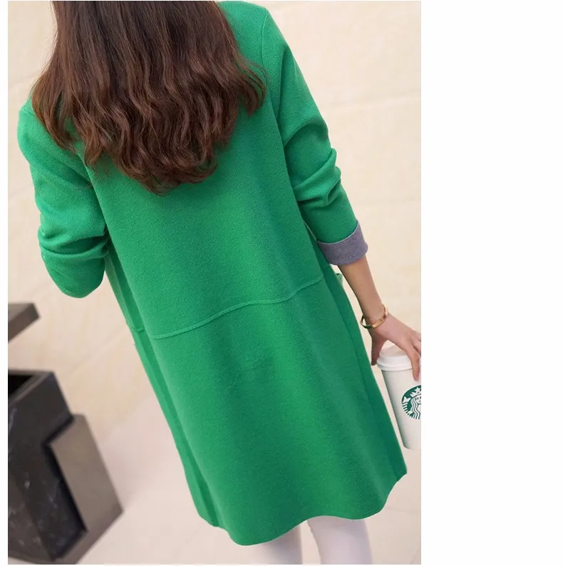 Suurte taskutega pikad kardiganid | kujundav pilt e-kaubamaja pildikogust