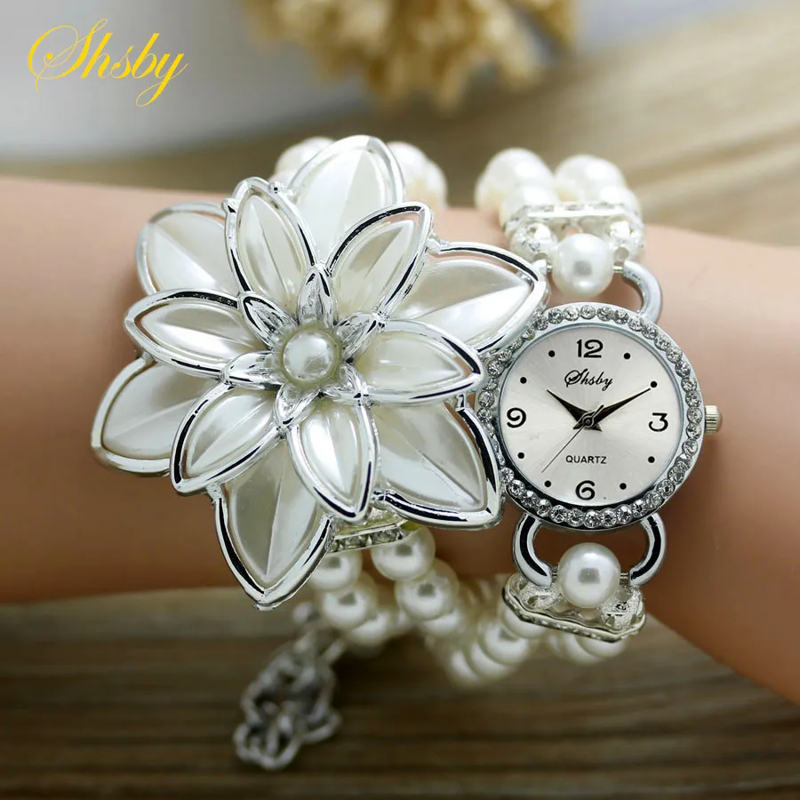 Top Trends: Shsby Fashion Women Rhinestone Watches Ladies Pearl Strap Many Petals Flower Bracelet Quartz Wristwatches Women Dress Watches Shoppable Styles