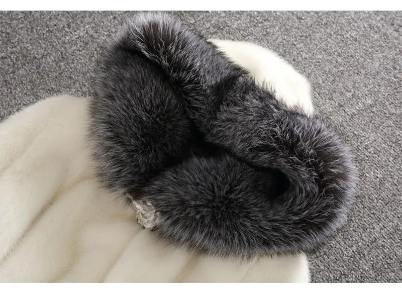 valge mantel halli karusnahast kraega