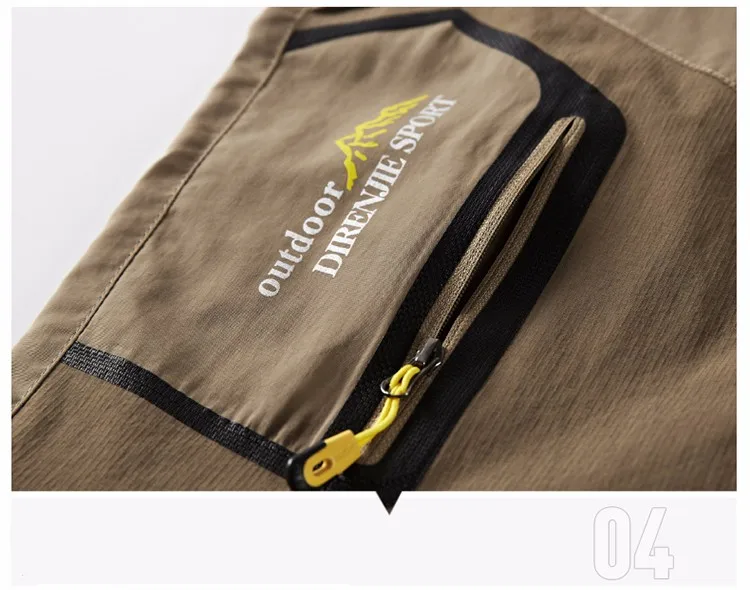 pruunid matkapüksid musta lukuga taskuga