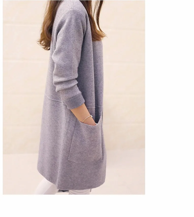 Suurte taskutega pikad kardiganid | kujundav pilt e-kaubamaja pildikogust