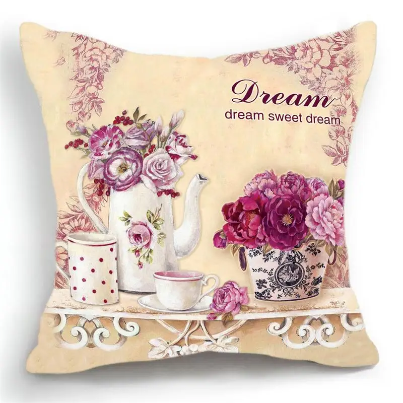 dekoratiivpadi lillede ja teekannuga, millel on kiri 'dream sweet dream'