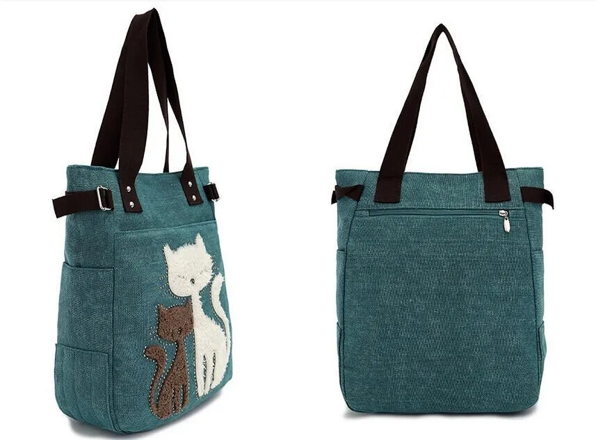 sinine õlakott kahe kassiga, mustad sangad