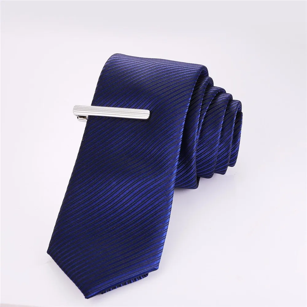 Komplekt mansetinööpidest ja lipsunõelast | kujundav pilt e-kaubamaja pildikogust