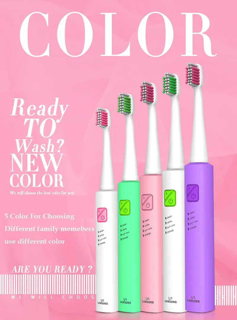 viis erinevat värvi elektrilist hambaharja roosa taustal