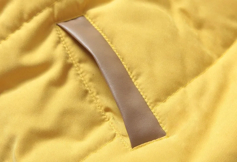 kollane vest detailse taskuga