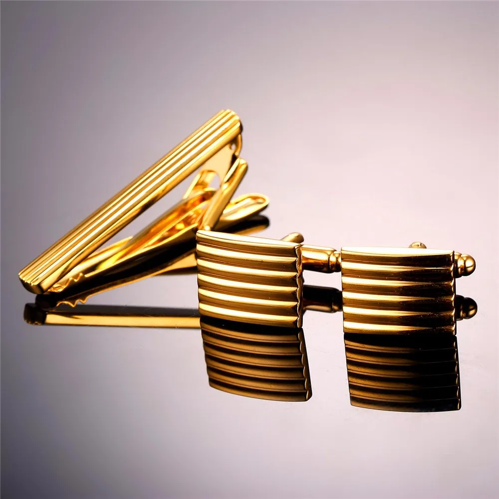 Komplekt mansetinööpidest ja lipsunõelast | kujundav pilt e-kaubamaja pildikogust