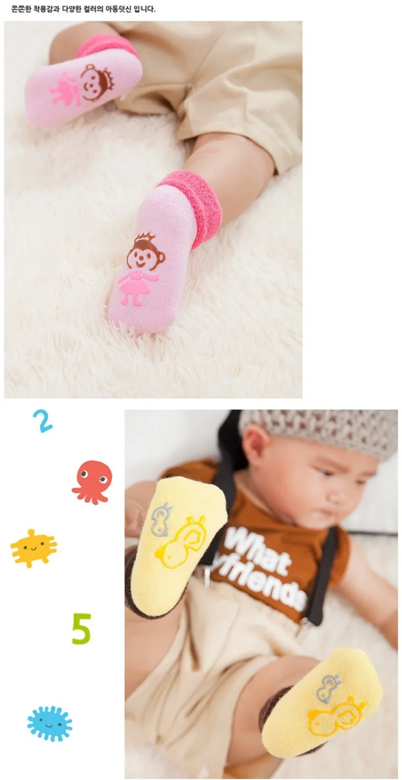 beebi jalas roosad ja kollased loomamustriga sokid