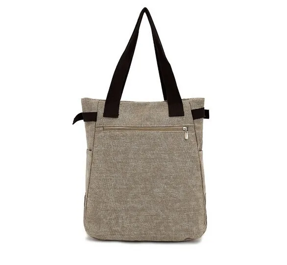 beež õlakott mustade sangadega ja lukuga taskuga