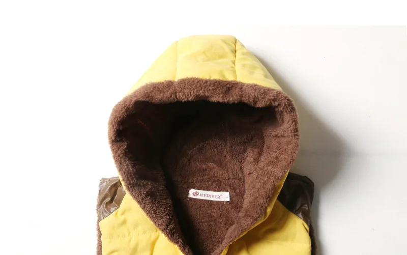 kollane kapuutsiga vest pruuni pehme voodriga