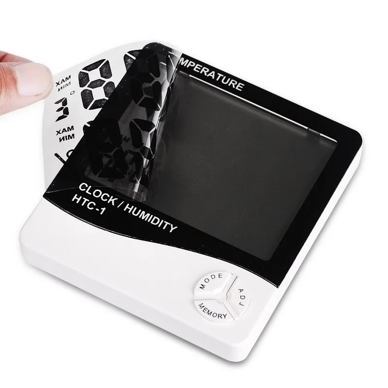 valge digitaalne niiskuse ja temperatuuri mõõdik, millel on suur ekraan ja nupud seadistamiseks