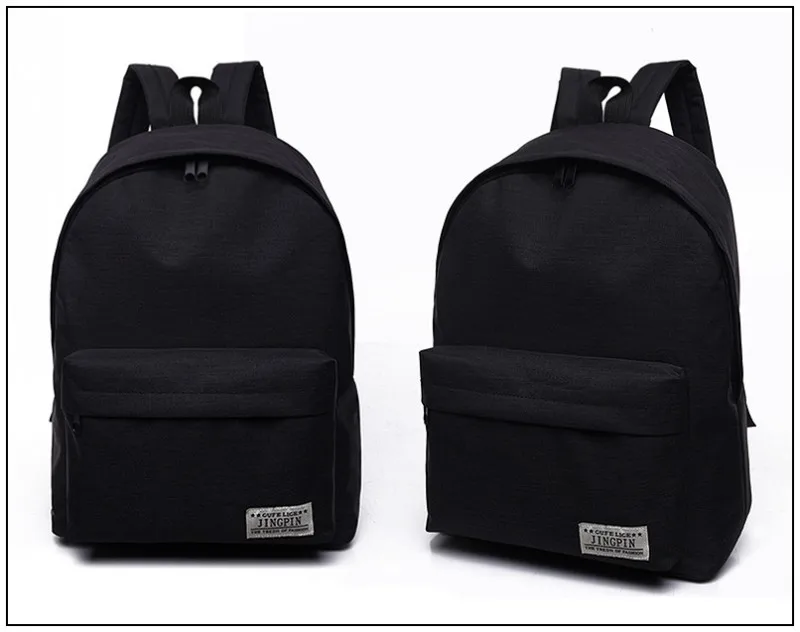 kaks musta purjeriidest seljakotti, millel on esiküljel lukuga tasku