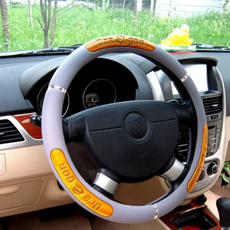 hall roolikate oranžide draakoni detailidega autos