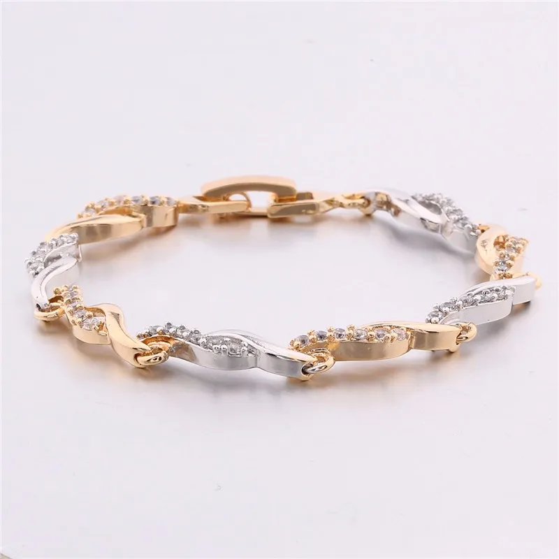 kuldsete ja hõbedaste lülidega naiste käekett, kaunistatud väikeste kivikestega