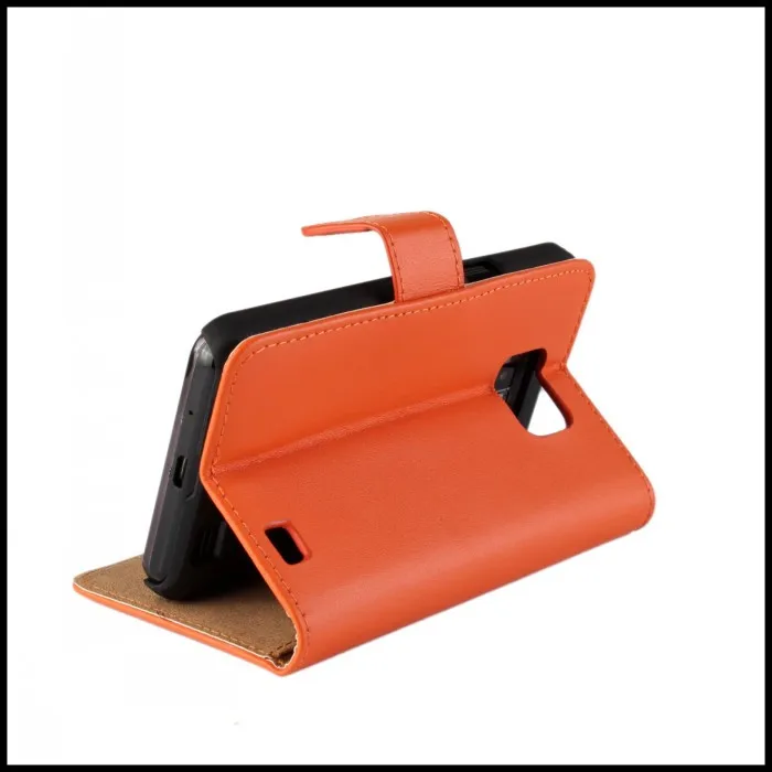 oranž telefoniümbris Samsungi telefonile, mis on avatud ja toetab telefoni püsti