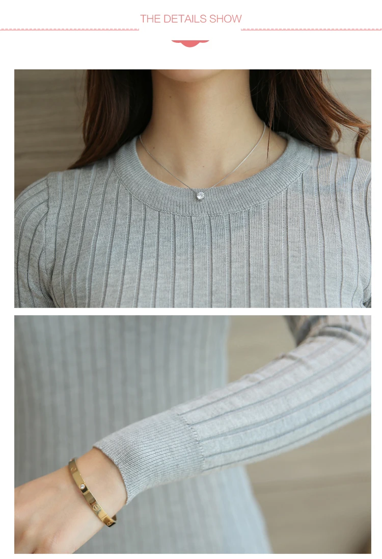 hall triibulise koega sviiter naise seljas, millel on ümar kaelus ja pikad varrukad