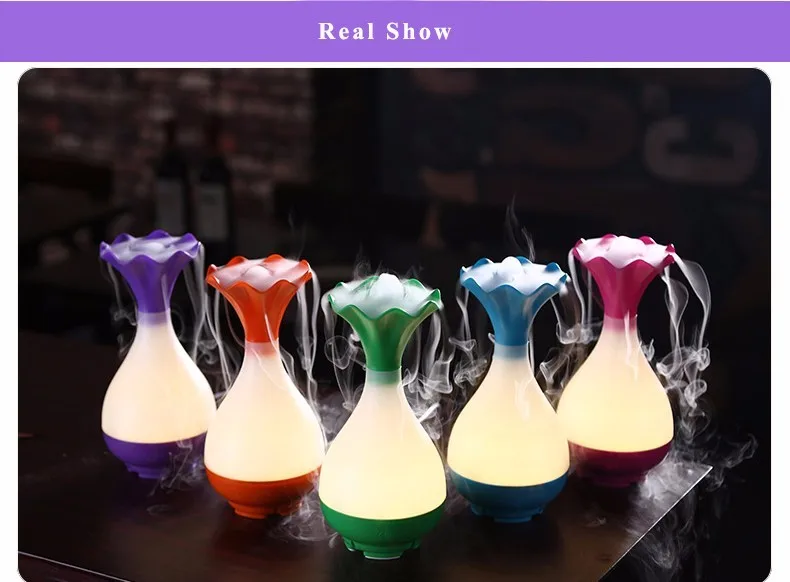 vaasikujulised õhuniisutajad erinevates värvides, mis eraldavad auru