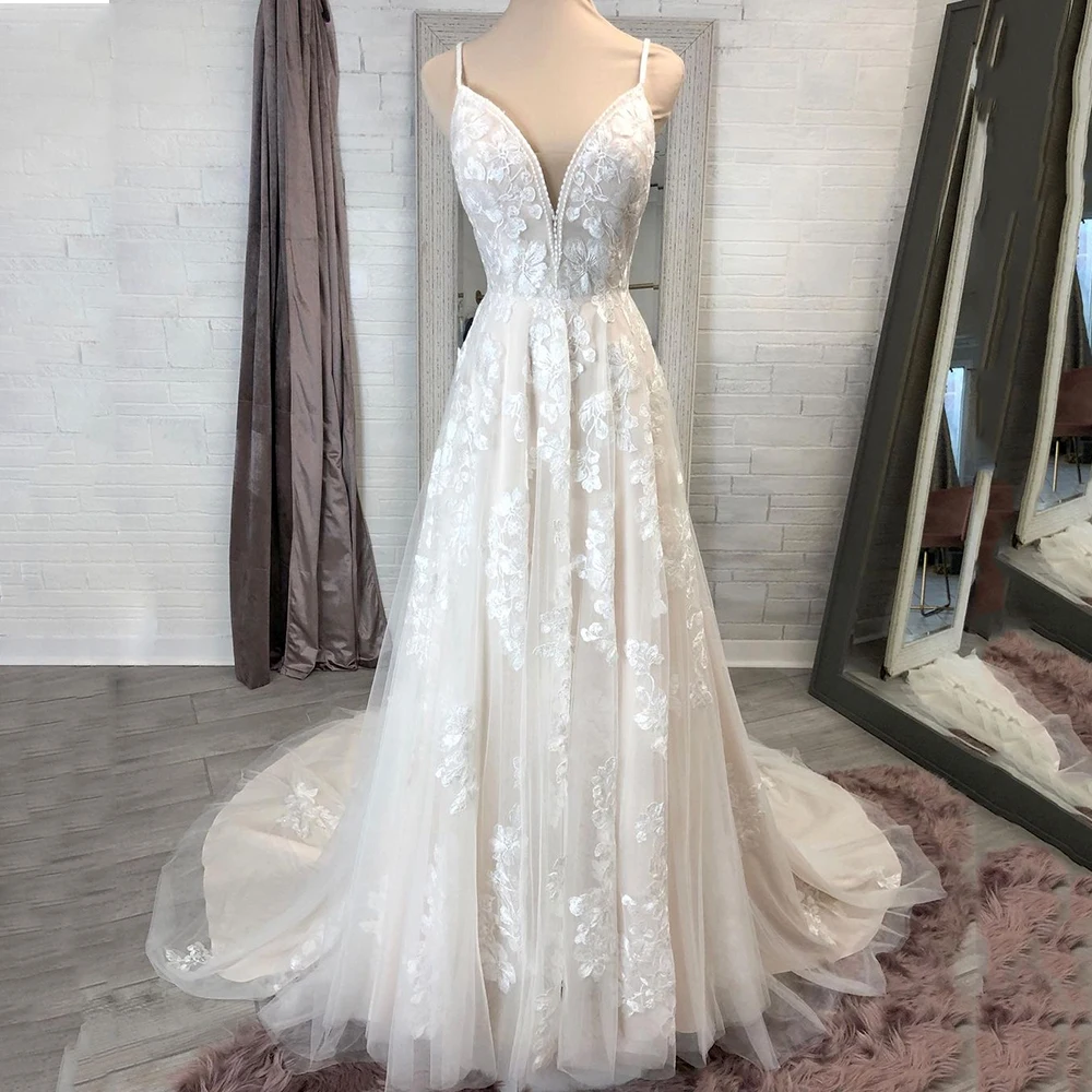 Top Trends: UZN Elegant Light Champagne A-Line Lace Appliques Wedding Dress V-Neck Sleeveless Beading Bridal Gown Ivory Spagetti Straps Open Shoppable Styles