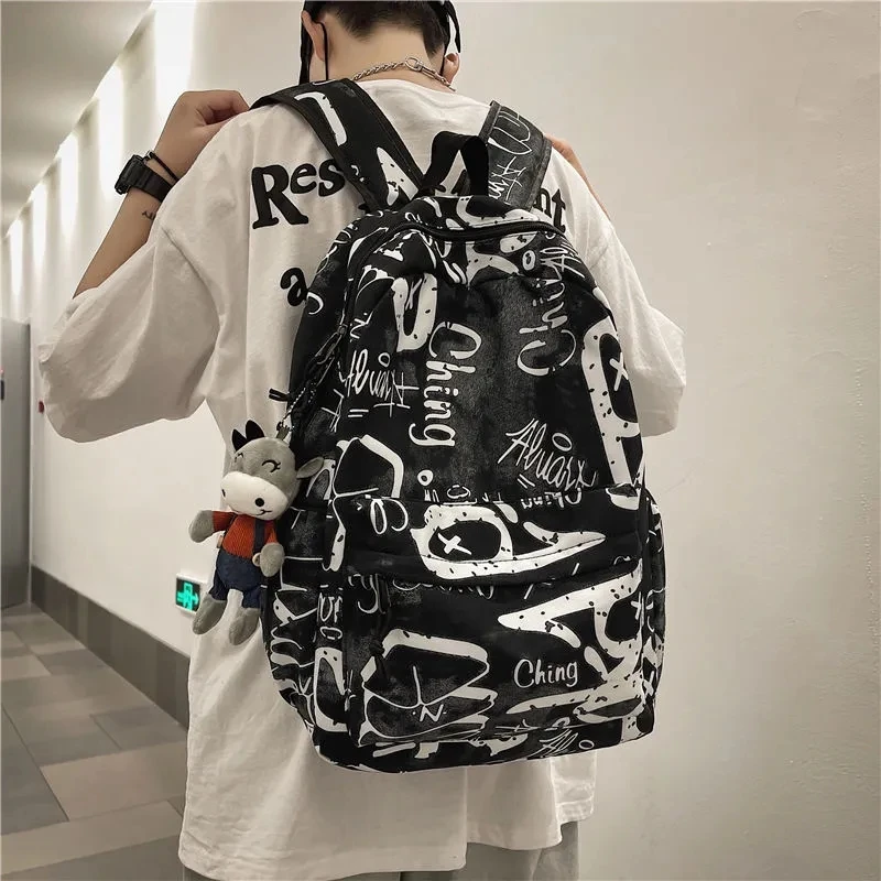 Top Trends: Graffiti Letter Couples Schoolbags Men Women Casual Treval Backpack Multi-Function Junior School Bags Shoppable Styles