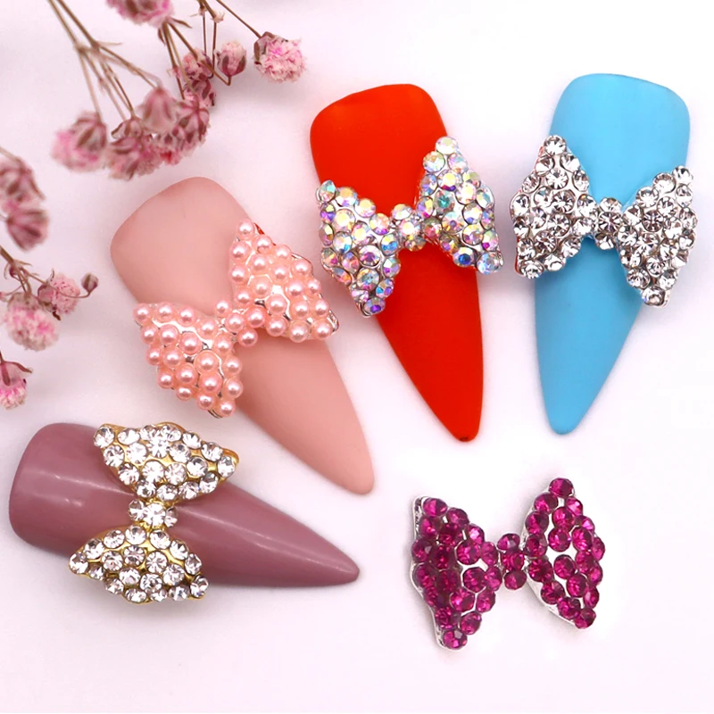 Top Trends: 10pcs / bag Charm 3D Metal Manicure Nail Art Decoration Golden Silver Bow Tie Bowknot Inlaid Rhinestone Pearl DIY Nail Accessories Shoppable Styles