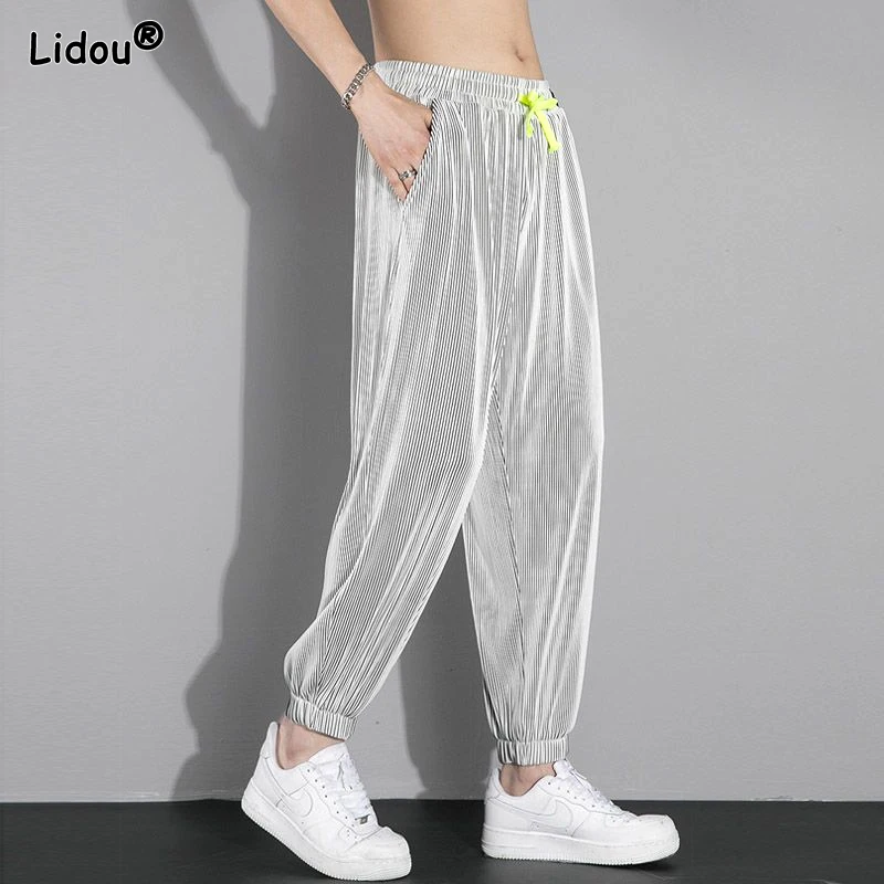 Top Trends: 2023 New Summer Fashion Simple Loose Casual Super Oversized Elastic Waist Strap Pocket Strap Feet Hanging Ice Silk Guard Pants Shoppable Styles