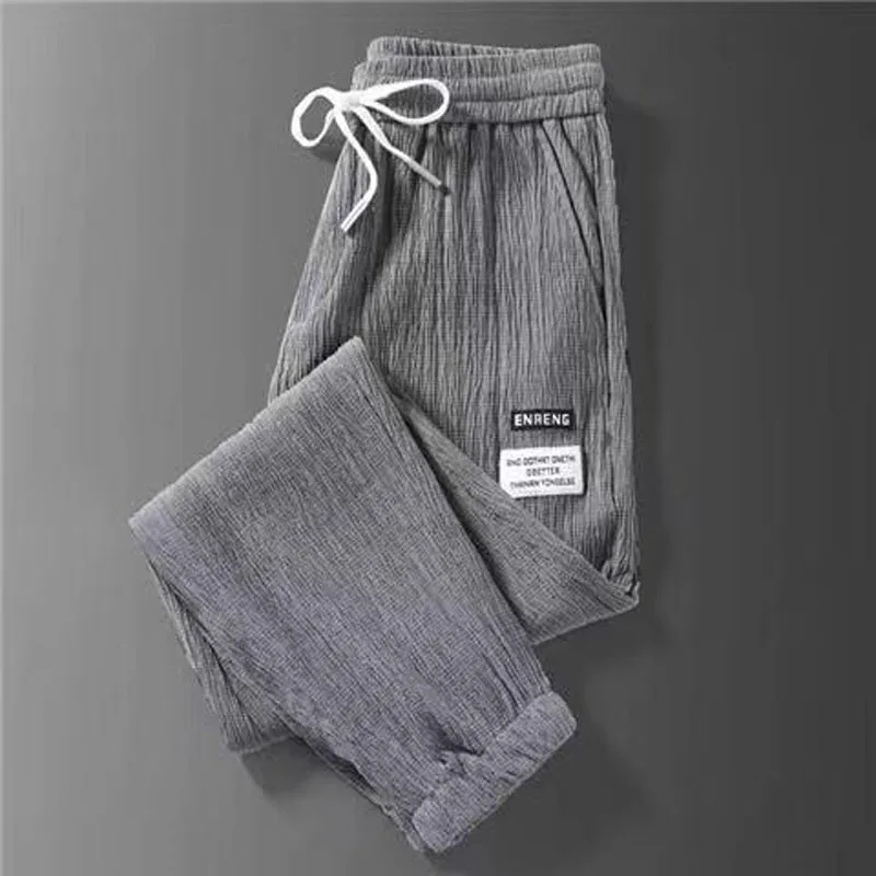 Top Trends: 2023 New Fashion Trend Casual Versatile Large Size Ice Silk Tie Feet Elastic Waist Durable Commuter Style Men's Casual Pants Shoppable Styles