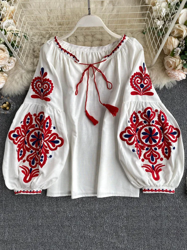 Top Trends: Women's Retro Blouse National Style Embroidered Lace-Up Tassel V-Neck Lantern Sleeve Tops Loose All-Match Female Blusa PL536 Shoppable Styles