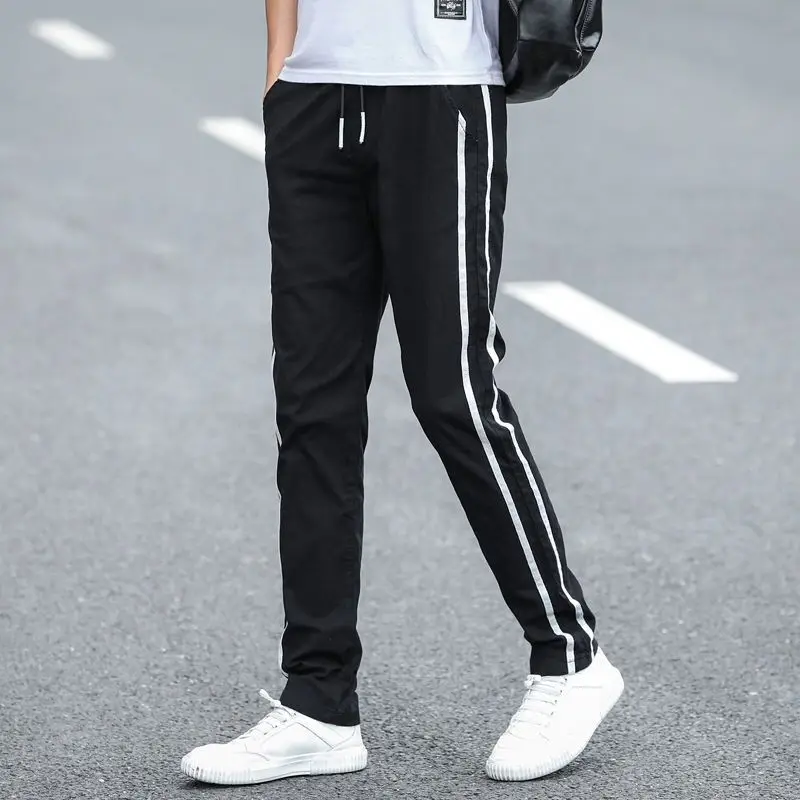 Top Trends: 2023 New Spring And Autumn Ice Silk Quick Dried Casual Korean Edition Loose And Slim Fashion Brand Men&#039;s Small Foot Sports Pants Shoppable Styles