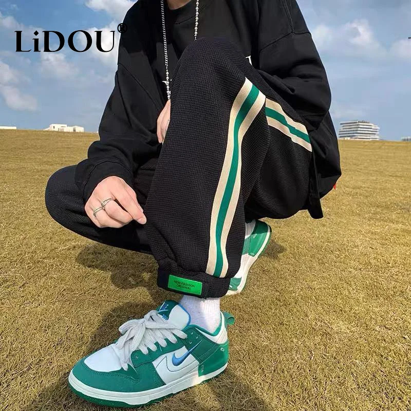 Top Trends: 2022 Autumn New Fashion Temperament Casual Sports Sweatpants Drawstring Loose Striped All Match Pants Streetwears Slacks Women Shoppable Styles