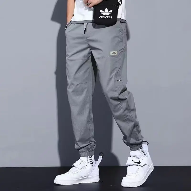 Top Trends: Casual Ventilate Patch Solid Color Men's Cargo Pants Classic Waist Drawstring Street Casual All-match Tie One's Feet Trousers Shoppable Styles - Image 4