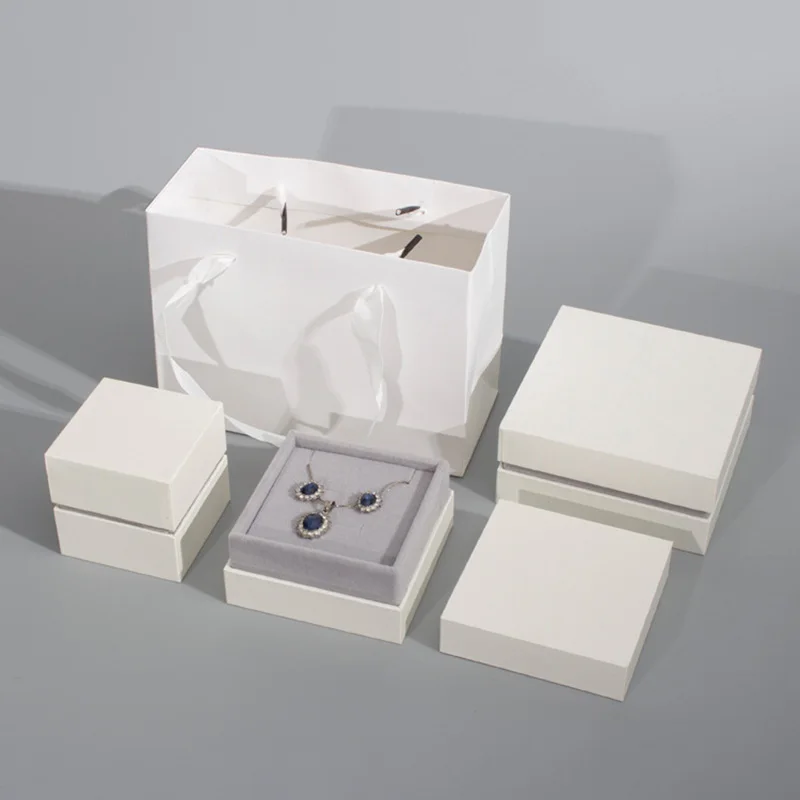 Top Trends: White Cardboard Velvet Lining Jewelry Box Ring Earring Necklace Packaging Box Portable Jewelry Set Box High-End Wedding Ring Box Shoppable Styles