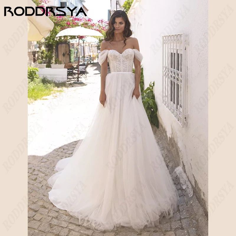 Top Trends: RODDRSYA Appliques Off Shoulder Wedding Dresses A-line Tulle Beach Bridal Gowns Sweetheart Backless Sleeveless Robe De Mariée Shoppable Styles