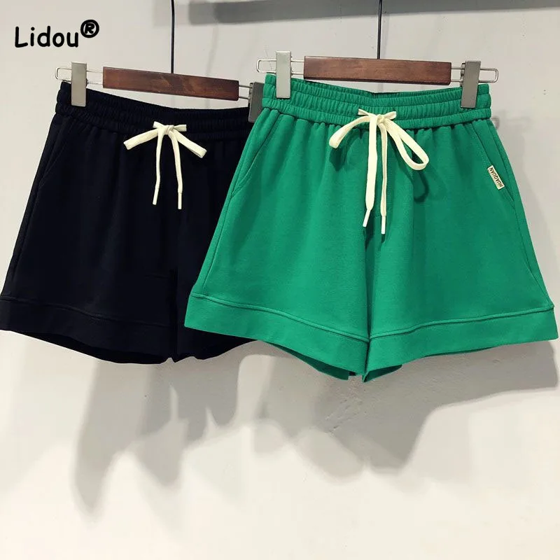 Top Trends: Female Loose Simplicity Solid Color Pockets Shorts Casual Fashion All-match Elastic Waist Lace Up Shorts Summer Women's Clothing Shoppable Styles