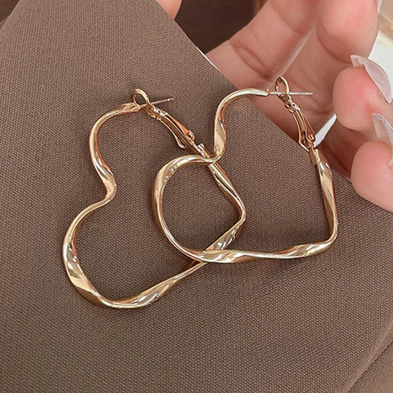 Top Trends: Twist Metal Heart Hoop Earrings For Women Golden Silver Color Hollow Out Big Love Earrings Brief Street Romantic Jewelry As Gift Shoppable Styles - Image 4