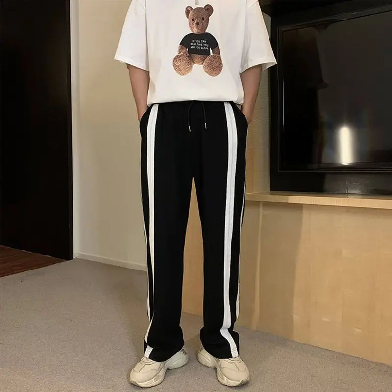 Top Trends: 2023 New Spring And Autumn Loose Fitting Straight Tube Trendy Brand Striped Sports High Street Korean Version Boy Casual Pants Shoppable Styles