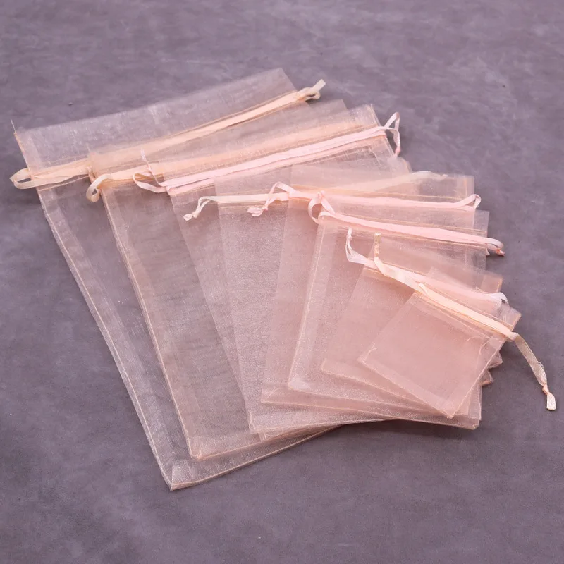 Top Trends: 50 / 100Pcs Champagne Pink Drawstring Organza Bag Handmade Jewelry Packaging Bags Christmas Gifts Bag Wedding Present Pouches Shoppable Styles