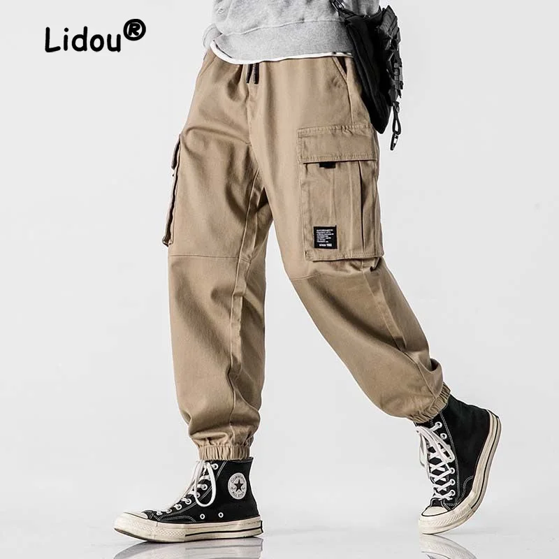 Top Trends: Loose Solid Color Pasting Cloth Men&#039;s Cargo Pants Classic Large Pocket Waist Drawstring Street Casual Pure Cotton Male Trousers Shoppable Styles