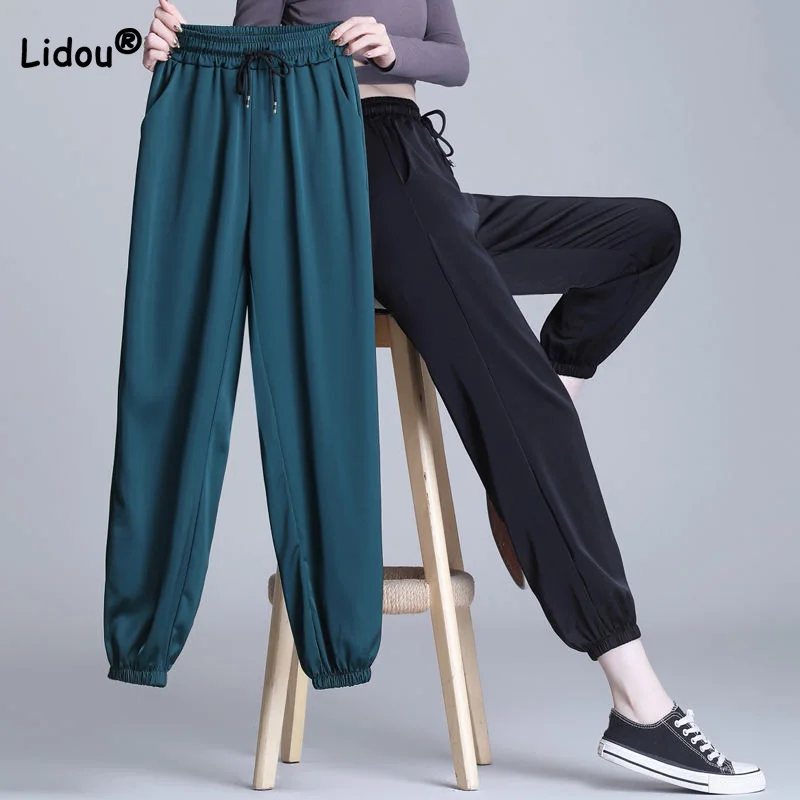 Top Trends: Ice Silk Satin Sports Pants For Women Personalized Street Summer Thin Loose Acetic Acid Drawstring Waist Pockets Harem Trousers Shoppable Styles